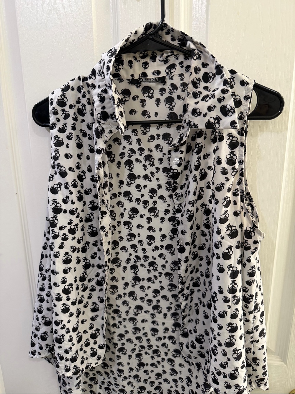 Sleeveless White Blouse with Black Skull Print